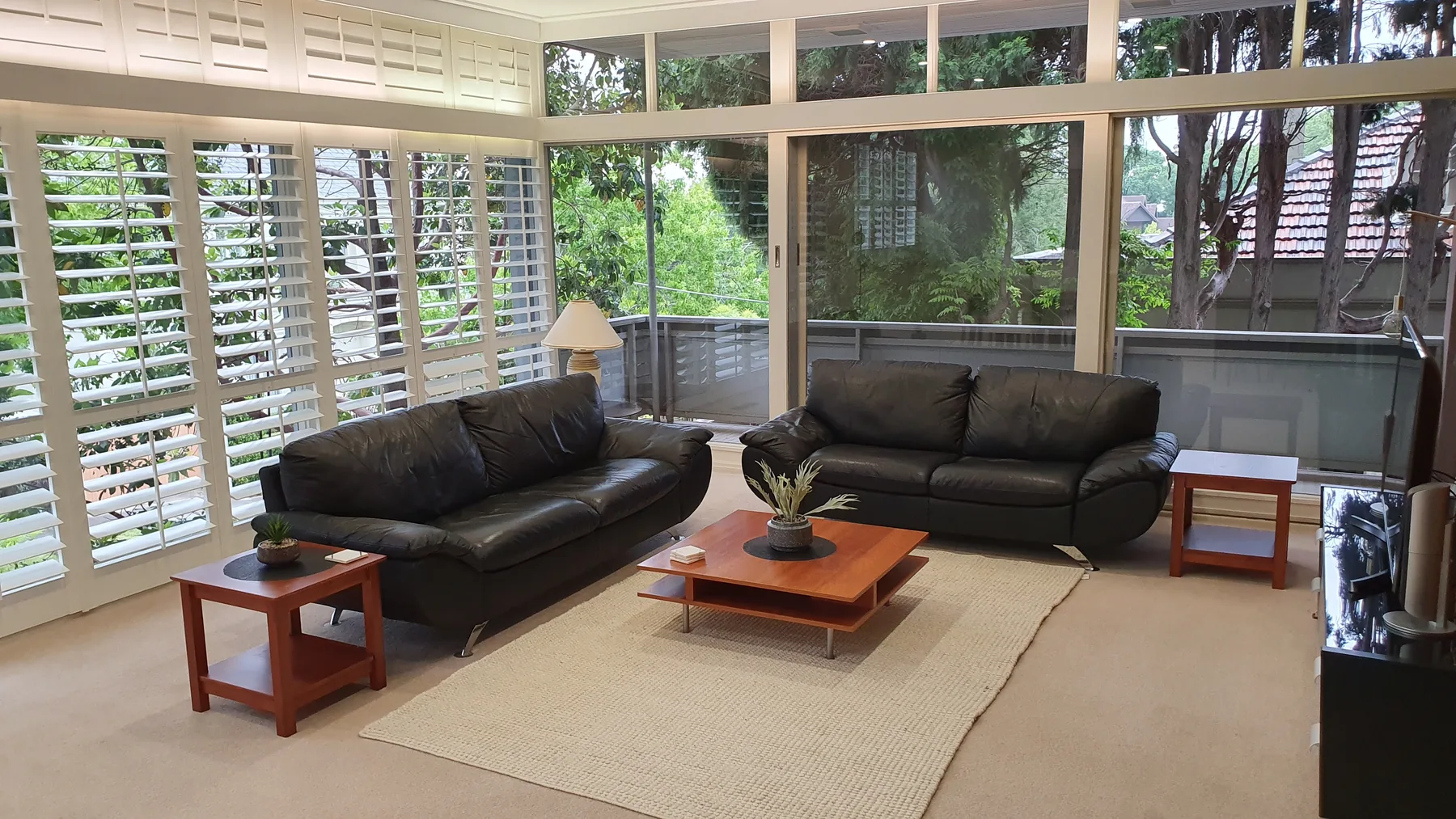 Sunlit living room at Toorak Luxury Living