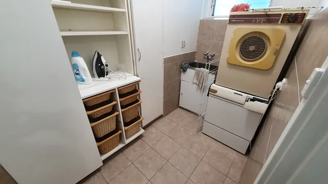 Laundry at Toorak Luxury Living